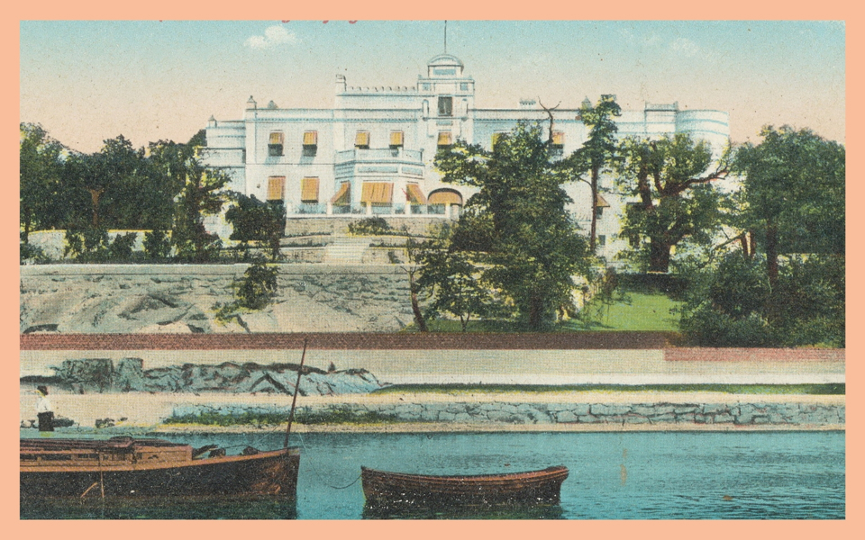 Vykort illustrerat som visar en stor villabyggnad.