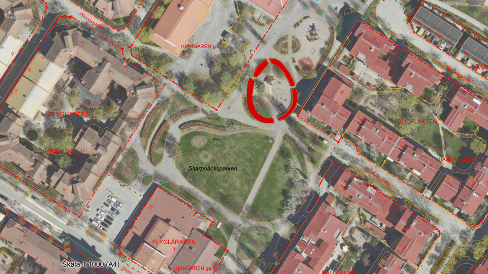 Flygvy över området med en rödmarkerad cirkel.
